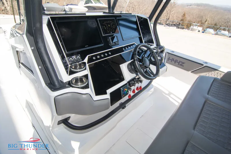  Yacht Photos Pics Hayaari Marine H44Z 2023 model boat dashboard with advanced navigation systems and steering wheel.