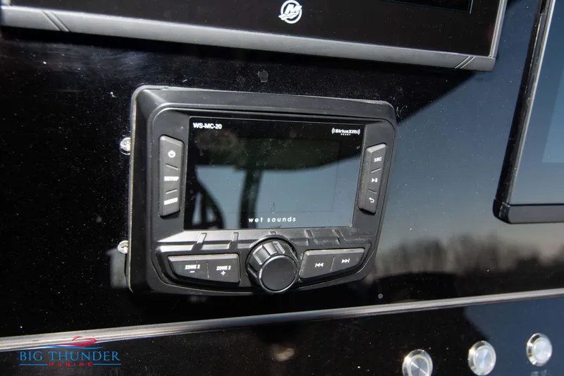  Yacht Photos Pics Close-up of 2023 Hayaari Marine H44Z dashboard with audio control panel.