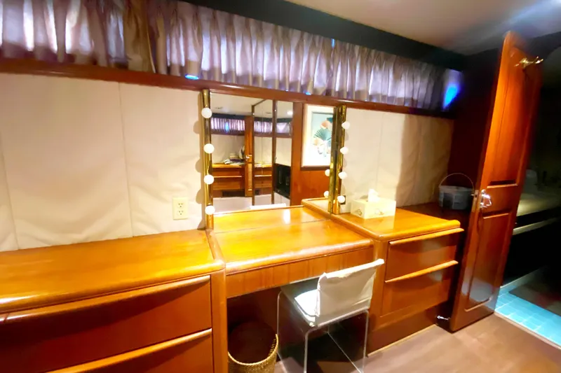 Sea Sharp Yacht Photos Pics Vanity area with mirror and lights on 1990 Viking 63 Motor Yacht.