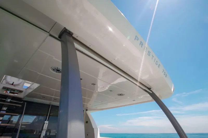 Oceana Yacht Photos Pics Luxury yacht Prestige 750, 2015 model, under clear blue sky.