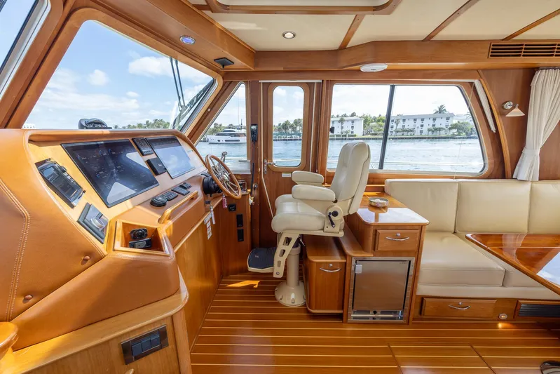 Pinch Me Yacht Photos Pics 2015 Sabre 48 Salon Express interior with helm, seating, and panoramic windows.
