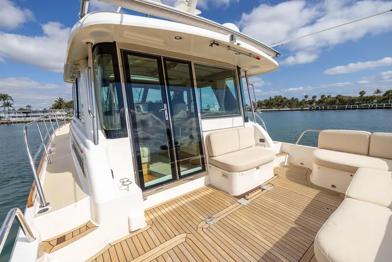 Pinch Me Yacht Photos Pics 2015 Sabre 48 Salon Express yacht with spacious deck and luxurious seating.
