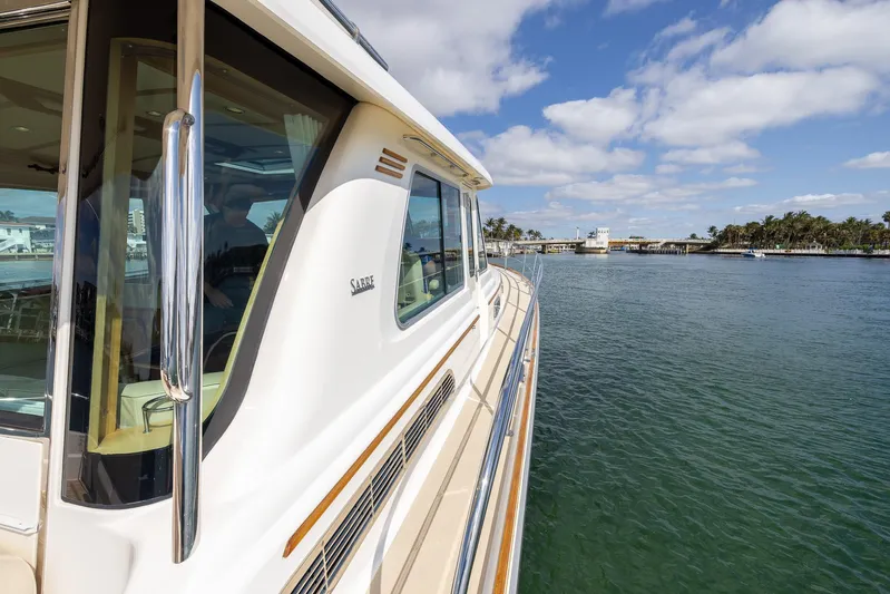 Pinch Me Yacht Photos Pics 2015 Sabre 48 Salon Express yacht cruising on calm waters under a blue sky.