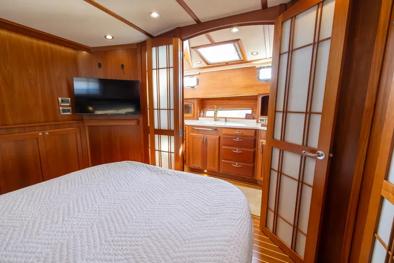 Pinch Me Yacht Photos Pics Luxurious interior of 2015 Sabre 48 Salon Express yacht with wood paneling and modern amenities.