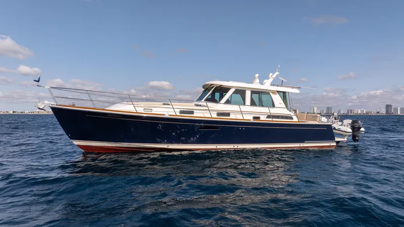 Pinch Me Yacht Photos Pics 2015 Sabre 48 Salon Express yacht on open water under a clear sky.