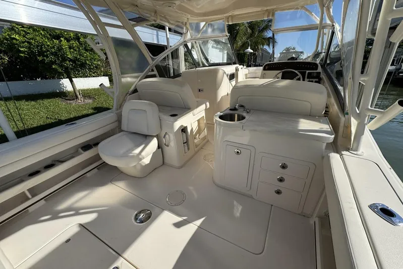  Yacht Photos Pics 2016 Grady-White Freedom 307 boat interior with seating and storage.