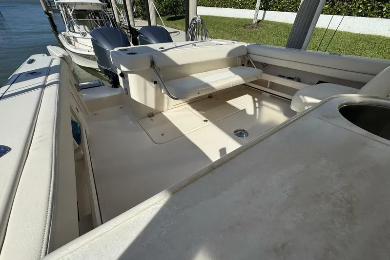  Yacht Photos Pics 2016 Grady-White Freedom 307 boat interior with seating and dual outboard motors.