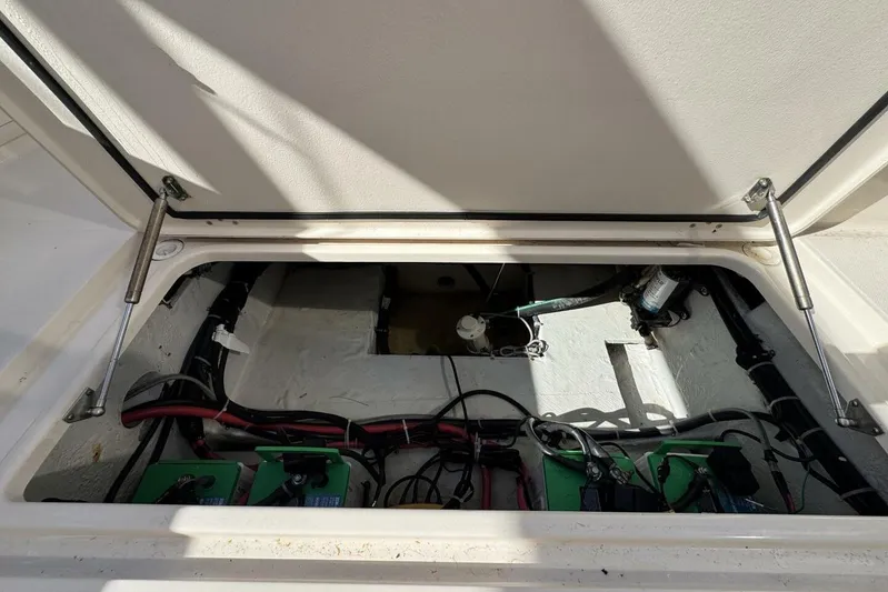  Yacht Photos Pics 2016 Grady-White Freedom 307 boat battery compartment with wiring and components.