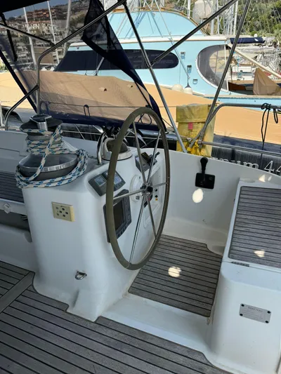  Yacht Photos Pics 2004 Beneteau 50 yacht cockpit with steering wheel and winches.