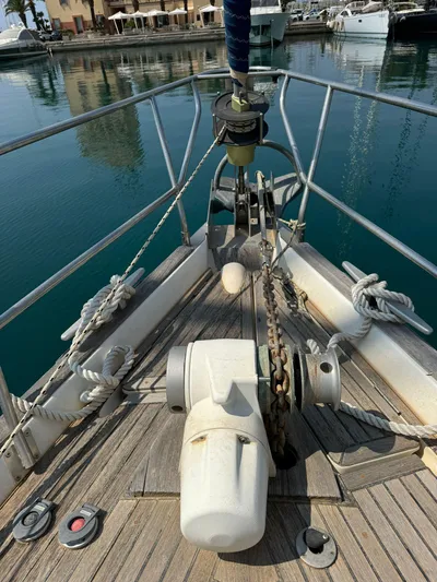  Yacht Photos Pics Bow of 2004 Beneteau 50 yacht with anchor and ropes in marina.