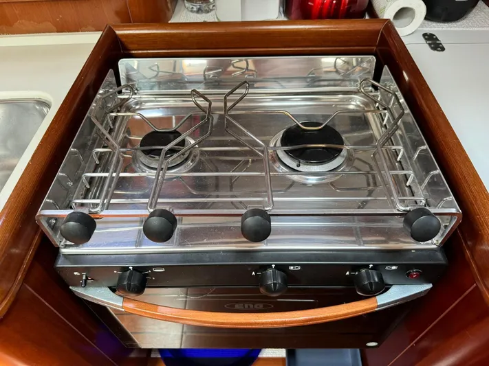  Yacht Photos Pics Two-burner stove in 2004 Beneteau 50 yacht kitchen, featuring stainless steel design.