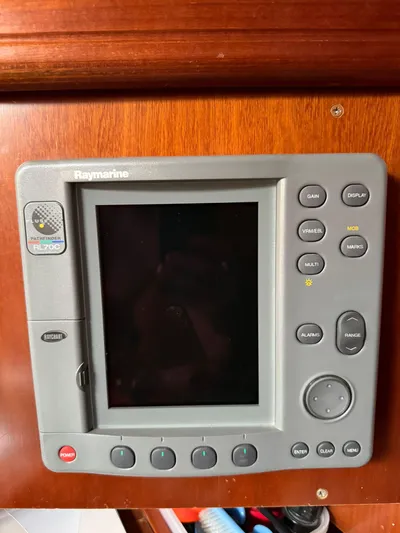  Yacht Photos Pics Raymarine navigation system on 2004 Beneteau 50 yacht, mounted on wooden panel.