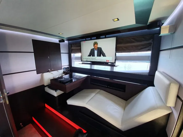  Yacht Photos Pics Luxurious interior of 2010 Galeon 700 Raptor SkyDeck with modern seating and TV.