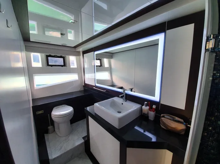  Yacht Photos Pics Luxurious bathroom in 2010 Galeon 700 Raptor SkyDeck yacht, featuring modern fixtures and elegant design.