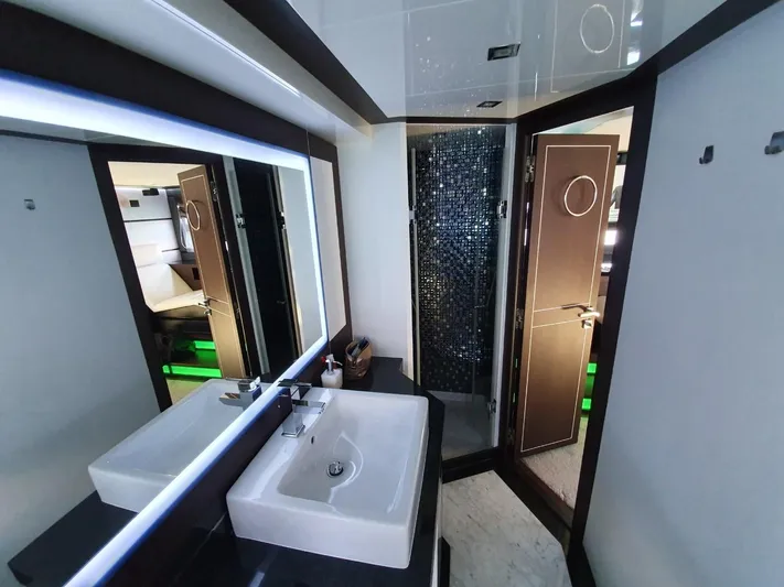  Yacht Photos Pics Luxurious bathroom interior of 2010 Galeon 700 Raptor SkyDeck yacht.