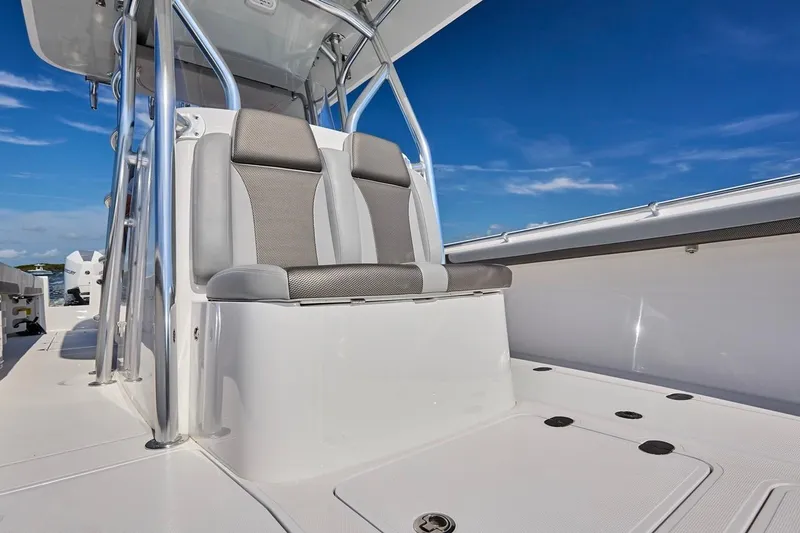  Yacht Photos Pics 2022 Bluewater 35 boat interior with sleek seating and stainless steel accents.