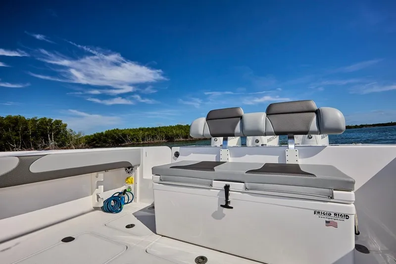  Yacht Photos Pics 2022 Bluewater 35 boat interior with seating, under clear blue sky.