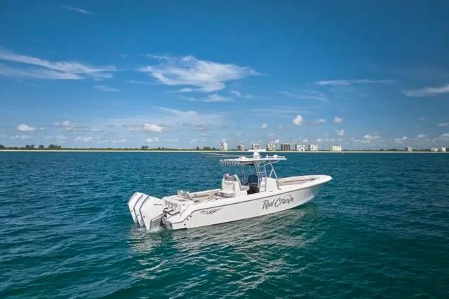  Yacht Photos Pics Bluewater 35 boat cruising on open sea, 2022 model, clear sky background.