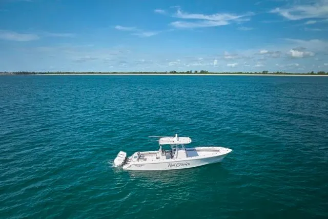  Yacht Photos Pics 2022 Bluewater 35 boat on open sea under clear blue sky.
