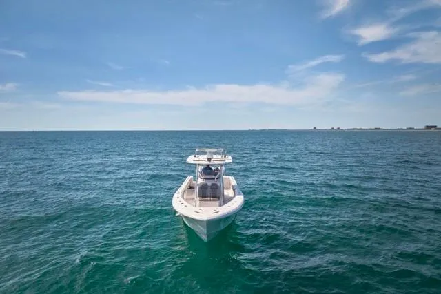  Yacht Photos Pics Bluewater 35 boat on open sea under clear sky, 2022 model.