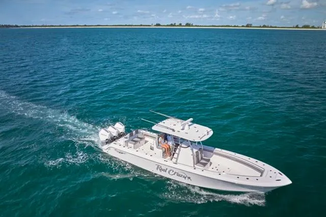  Yacht Photos Pics 2022 Bluewater 35 boat cruising on open ocean waters.