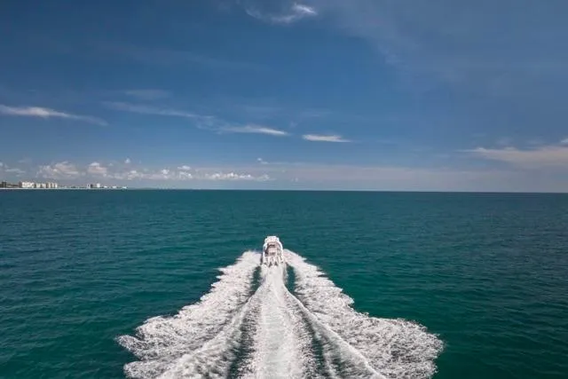  Yacht Photos Pics Bluewater 35 boat cruising on open ocean under clear blue sky, 2022 model.