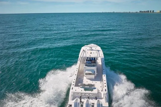  Yacht Photos Pics 2022 Bluewater 35 boat cruising on open ocean waters.