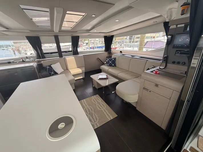 Darla Jay Yacht Photos Pics Luxurious interior of 2023 Fountaine Pajot Aura 51 yacht with modern furnishings.