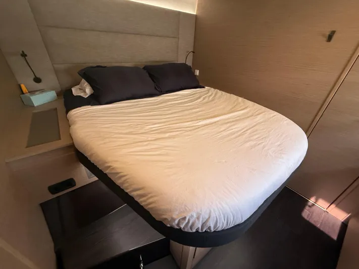 Darla Jay Yacht Photos Pics Luxurious bedroom interior of 2023 Fountaine Pajot Aura 51 yacht with modern design.