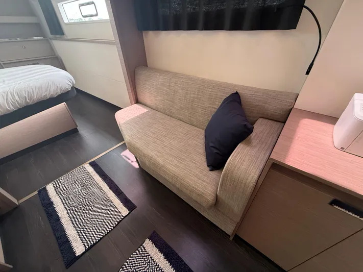 Darla Jay Yacht Photos Pics 2023 Fountaine Pajot Aura 51 interior with sofa, bed, and modern decor.
