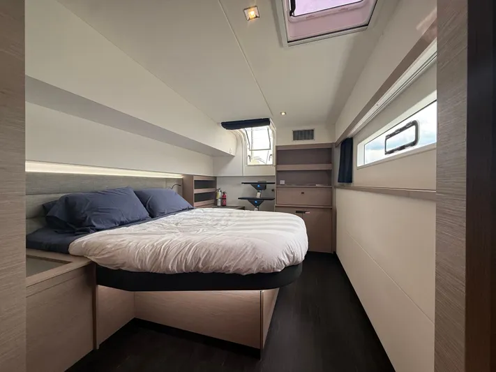 Darla Jay Yacht Photos Pics Luxurious bedroom interior of 2023 Fountaine Pajot Aura 51 yacht with modern design.