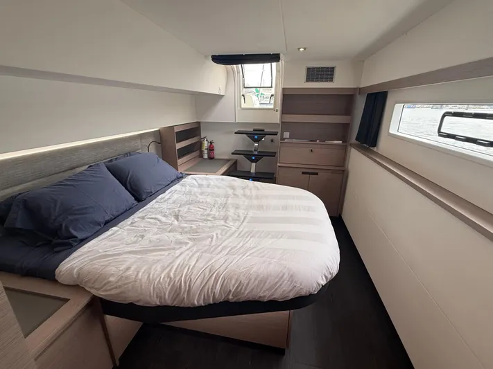 Darla Jay Yacht Photos Pics Luxurious bedroom interior of 2023 Fountaine Pajot Aura 51 yacht with modern design.