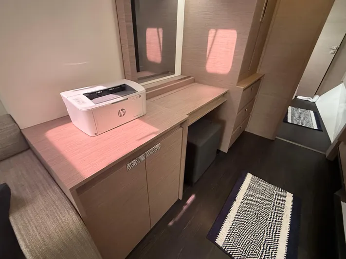 Darla Jay Yacht Photos Pics Modern interior of 2023 Fountaine Pajot Aura 51 yacht with desk and printer.
