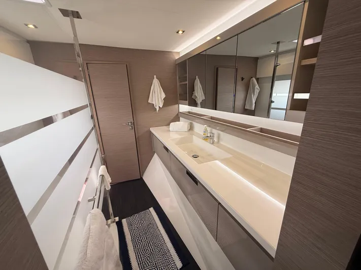 Darla Jay Yacht Photos Pics Luxurious bathroom interior of 2023 Fountaine Pajot Aura 51 yacht, featuring modern design and amenities.