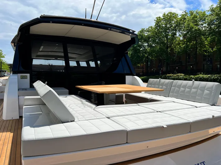  Yacht Photos Pics 2026 Pardo Yachts GT52 luxury yacht with spacious outdoor seating and dining area.