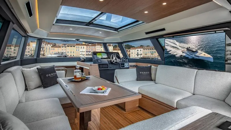  Yacht Photos Pics Luxurious interior of 2026 Pardo Yachts GT52 with spacious seating and panoramic windows.