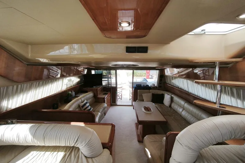  Yacht Photos Pics Luxurious interior of 2003 Ferretti Yachts 620 with elegant seating and modern decor.