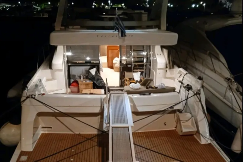  Yacht Photos Pics 2003 Ferretti Yachts 620, rear view at night, showcasing deck and interior.