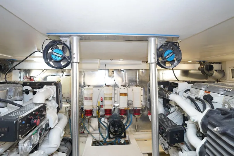 Etan Yacht Photos Pics Engine room of 2005 Ocean Yachts 50 Super Sport with dual engines and ventilation system.