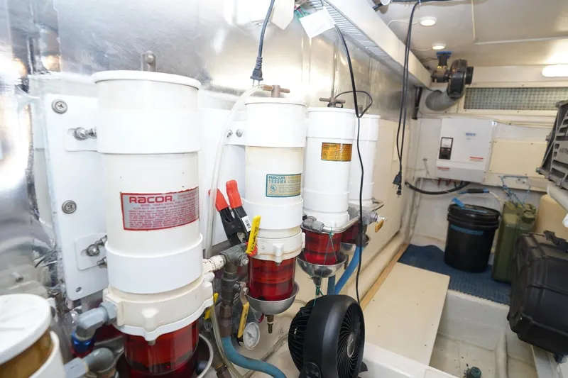 Etan Yacht Photos Pics Engine room of 2005 Ocean Yachts 50 Super Sport with Racor fuel filters.