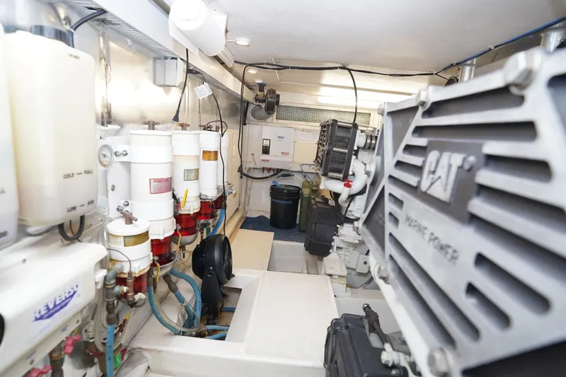 Etan Yacht Photos Pics Engine room of 2005 Ocean Yachts 50 Super Sport with CAT marine power.