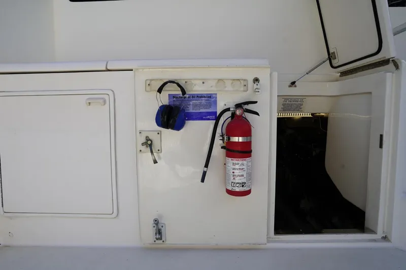 Etan Yacht Photos Pics 2005 Ocean Yachts 50 Super Sport yacht interior with fire extinguisher and safety equipment.