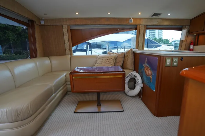 Etan Yacht Photos Pics Luxurious interior of 2005 Ocean Yachts 50 Super Sport with plush seating and elegant decor.