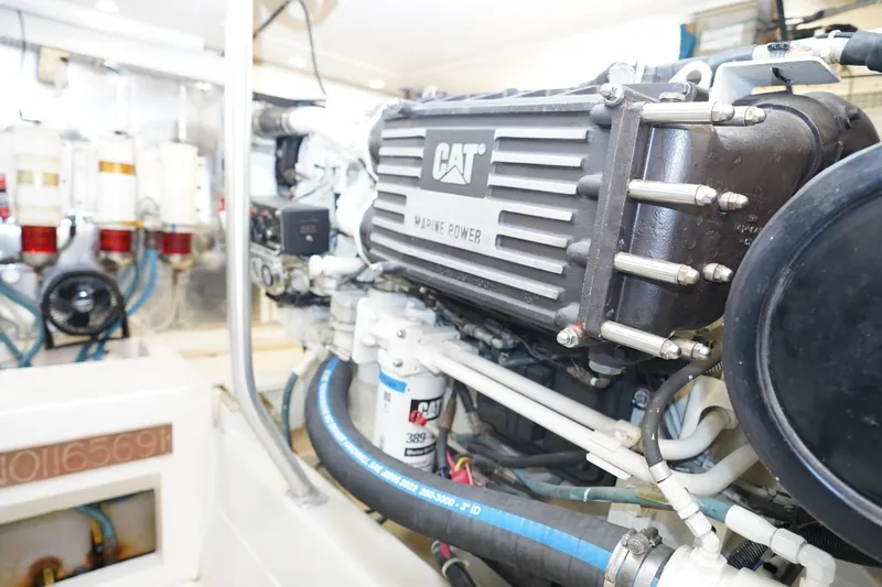 Etan Yacht Photos Pics Engine room of 2005 Ocean Yachts 50 Super Sport with CAT marine power engine.
