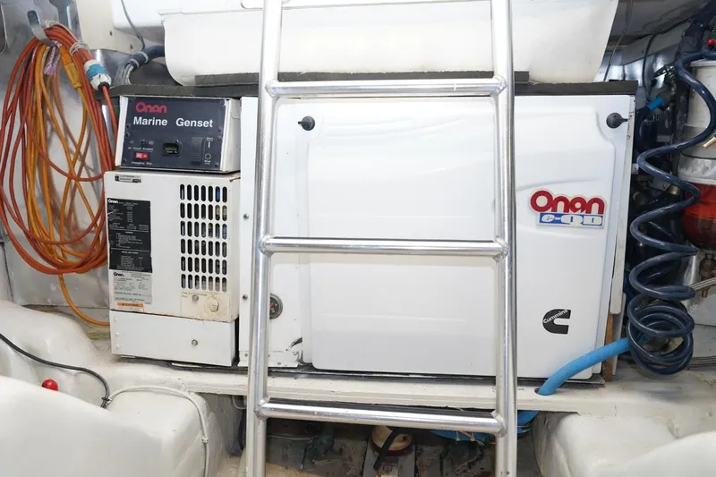 Etan Yacht Photos Pics Engine room of 2005 Ocean Yachts 50 Super Sport with Onan Marine Genset.