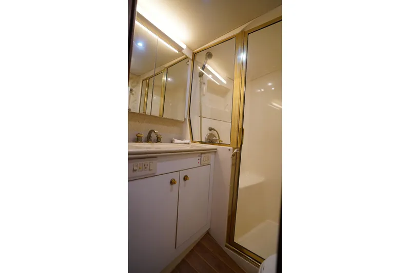 Etan Yacht Photos Pics Bathroom interior of 2005 Ocean Yachts 50 Super Sport with shower and vanity.