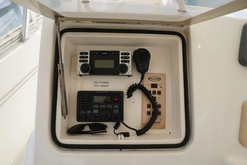 Etan Yacht Photos Pics Control panel of 2005 Ocean Yachts 50 Super Sport with radio and microphone.