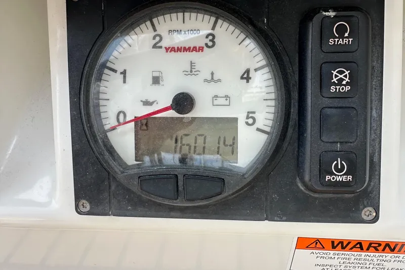  Yacht Photos Pics Yanmar engine control panel on a 2018 Jeanneau 54 sailboat, showing RPM and warning indicators.