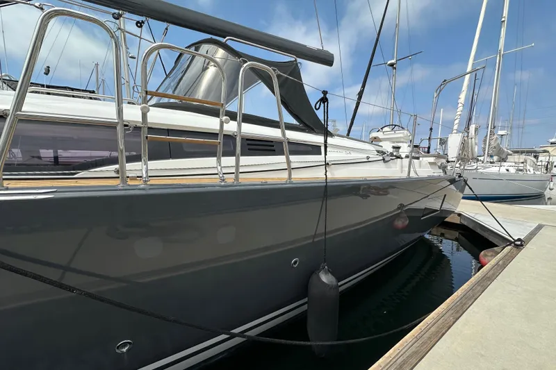  Yacht Photos Pics 2018 Jeanneau 54 yacht docked at marina, sleek design, sunny day.