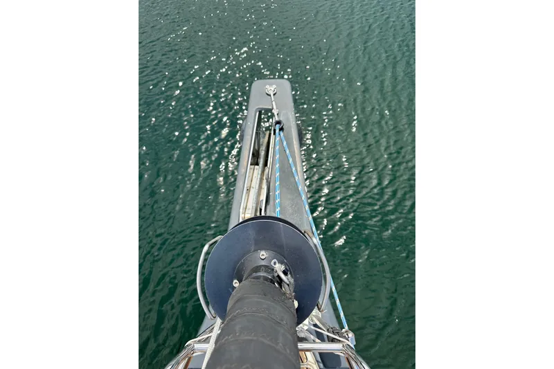  Yacht Photos Pics Bow view of 2018 Jeanneau 54 sailboat on calm water.